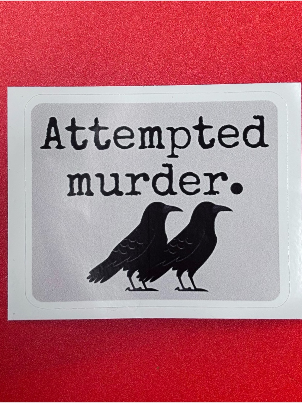 Sticker - Crow “Attempted Murder” Funny and great for bird lovers - 3”x2”